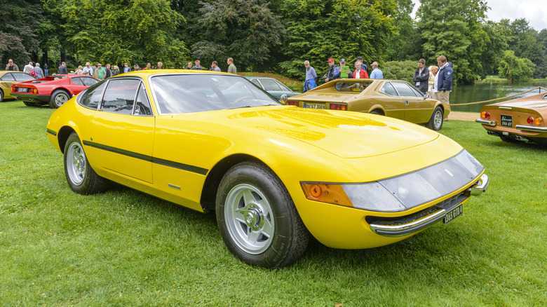 A yellow 1973 Ferrari 365 GTB/4 Daytona on display