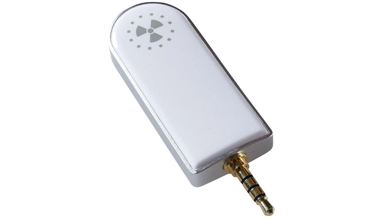 A smartphone geiger counter showing a 3.5 mm connection.