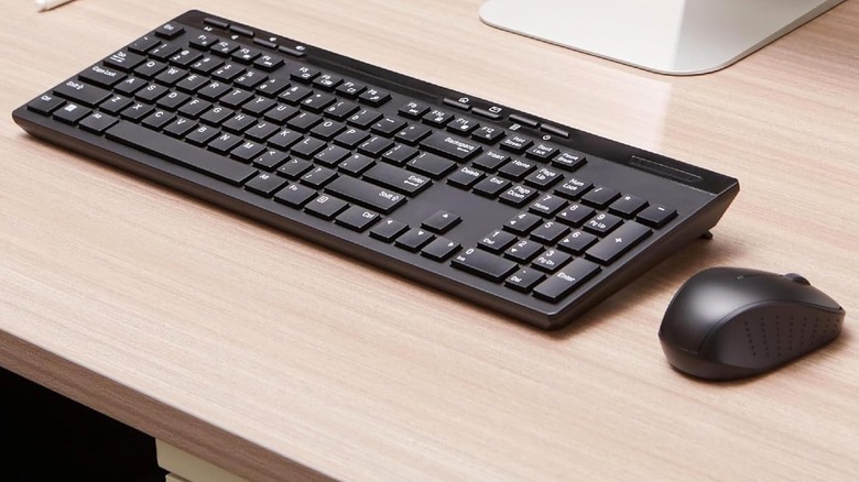 keyboard and mouse on a desk