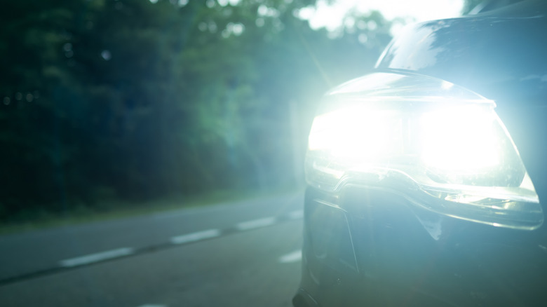 LED headlight blazing brightly on a car