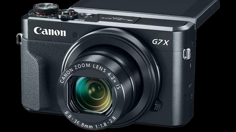 A camera on a black background