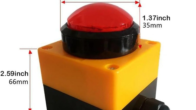 A big red button connected by a USB.