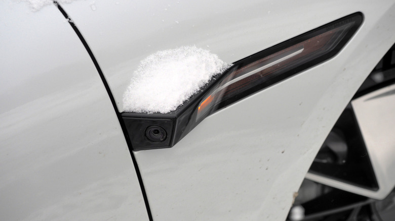 2026 Polestar 4 side camera with a topping of snow