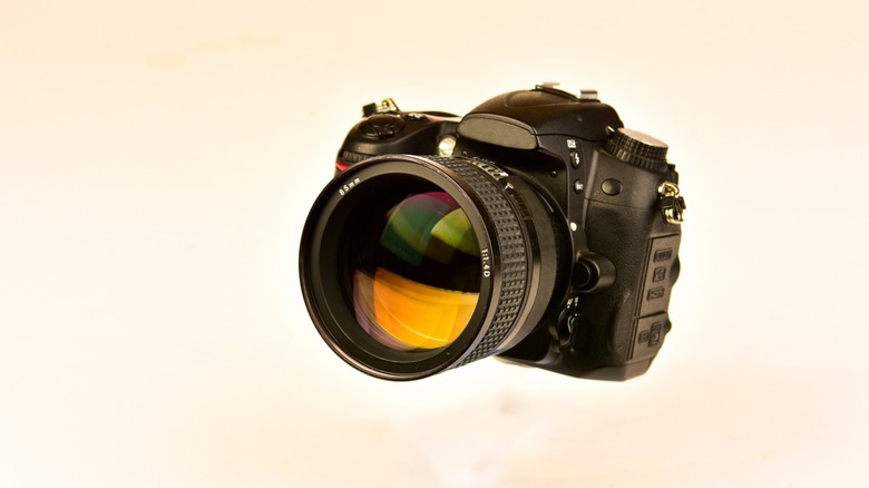 A digital camera with a prime lens attached