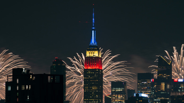 4th of July fireworks celebrations in New York with the Empire State Building in the foreground.