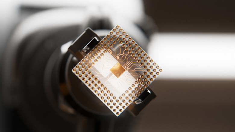 A robot showing a CPU circuit board.