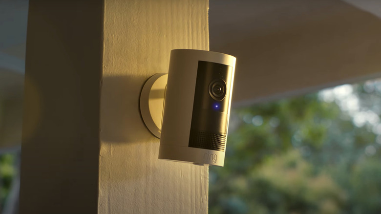 A Ring Outdoor Cam Plus attached to an outdoor pillar