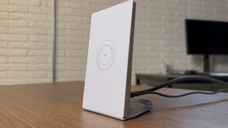 Starlink Router Mini on table connected to cables