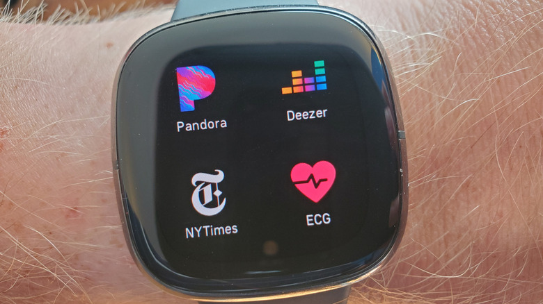 A Google Pixel Watch displaying apps, worn on a wrist