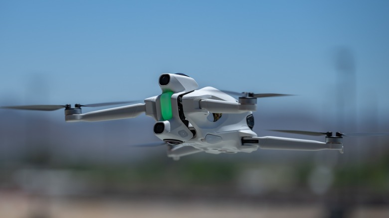 The Antigravity A1 flying in front of a blurred background.