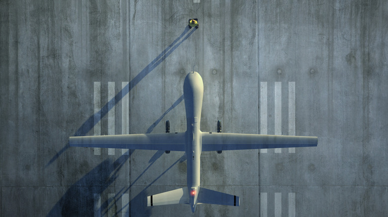 Military drone on tarmac ready for take off