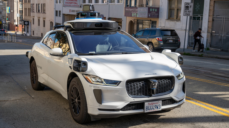 Waymo self-driven taxi in the street of San Francisco during springtime day