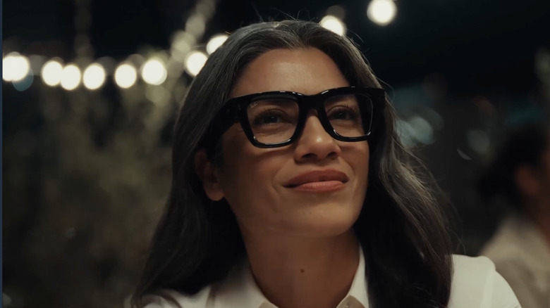 Woman wearing Meta Ray-Ban Display.