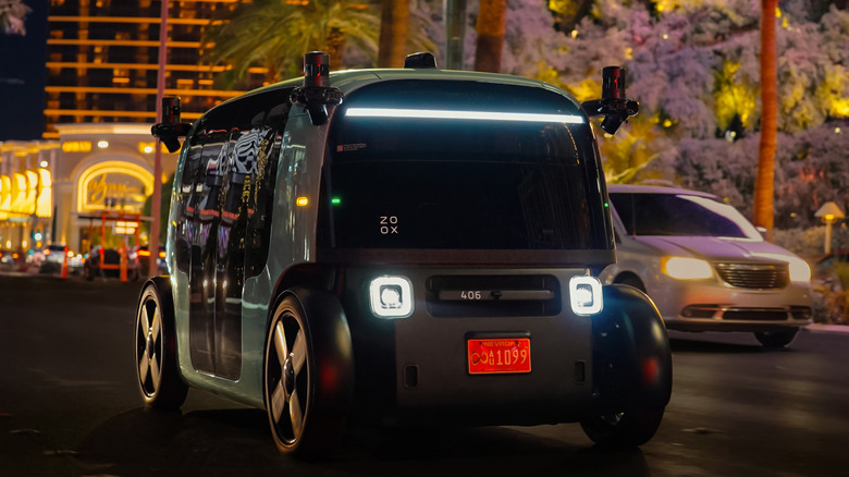 Zoox robotaxi at night on Las Vegas Street