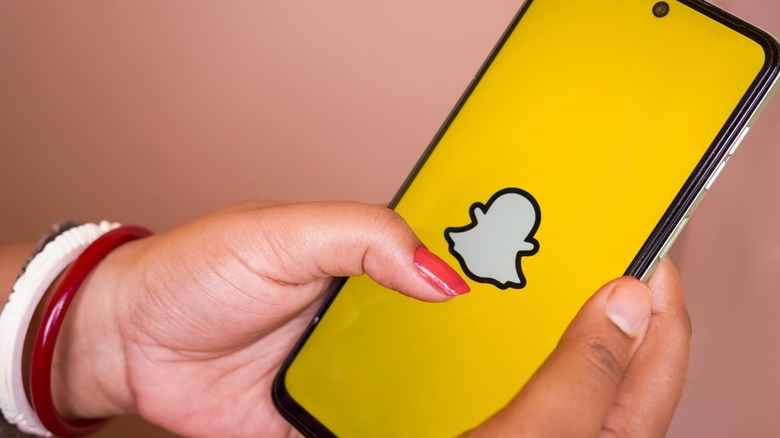 Snapchat app logo on a phone