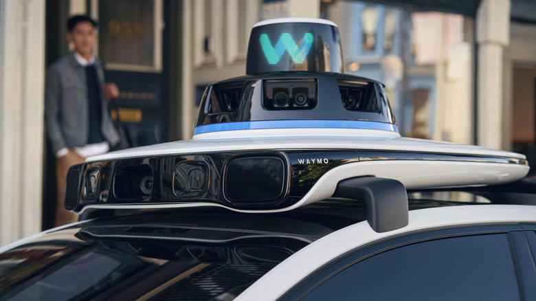 A close-up of a Waymo vehicle