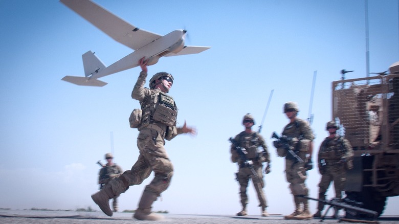 U.S. Army paratroopers launching an RQ-20 Puma