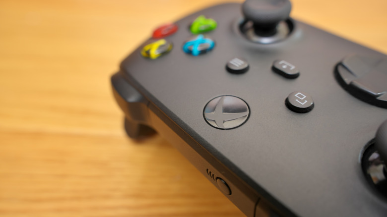 Close up of Xbox Series X/S controller on a table.