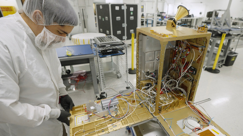 Scientist prepares a satellite with the Nvidia chip