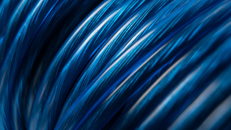 A bundle of speaker wire with a blue jacket.