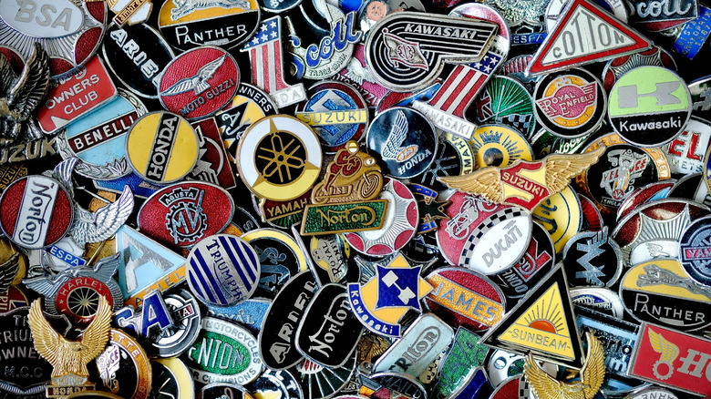 piles of vintage motorcycle badges