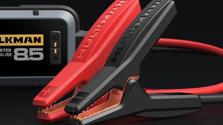 jumper cables attached to a Hulkman Alpha 85 jump starter