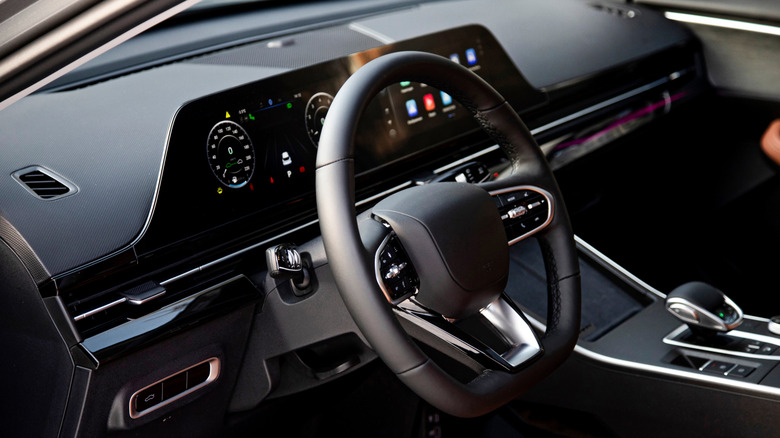 A car's interior showcasing a tech-heavy dashboard