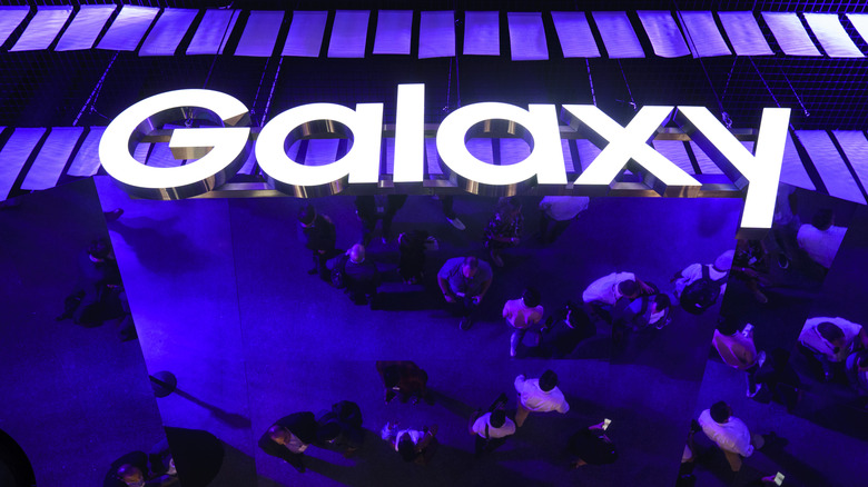 Samsung Galaxy signage hanging from a ceiling at a launch event