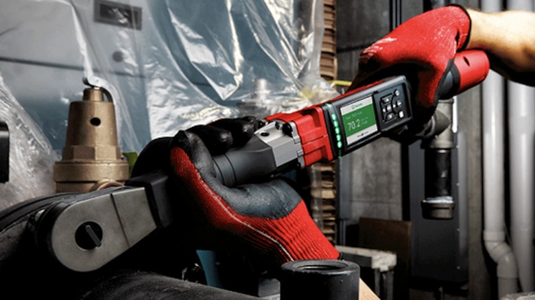 Milwaukee M12 Fuel ½-inch Digital Torque Wrench in use