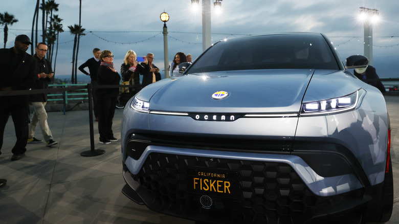 Fisker Ocean on official display at Manhattan Pier, 2023, with visitors in Los Angeles.
