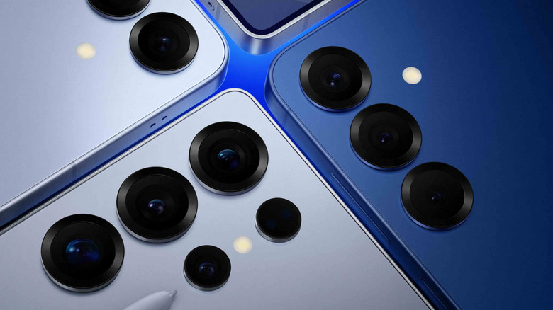 Close up of cameras on several Samsung Galaxy smartphones