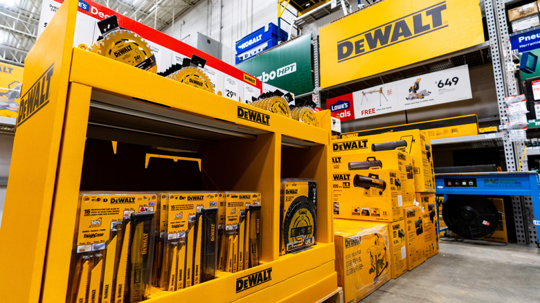 DeWalt brand power tools on display at Lowe's hardware store.