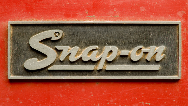A close-up view of the Snap-on logo on red toolbox