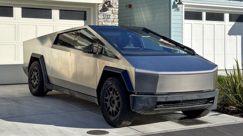 A Tesla Cybertruck in a driveway