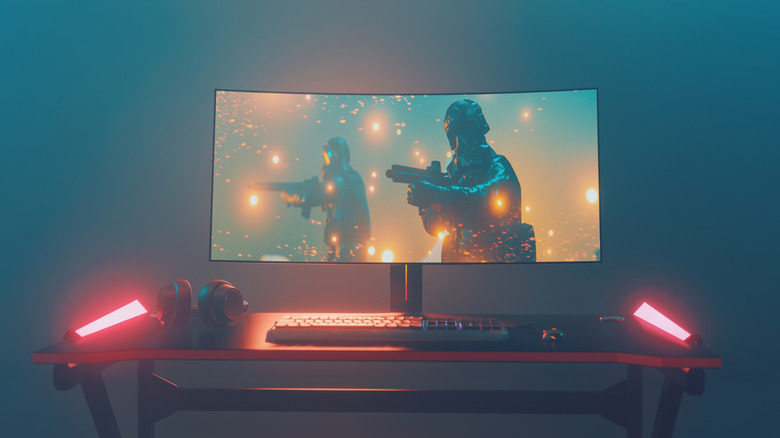 Large desktop computer stands on a desk with a computer monitor