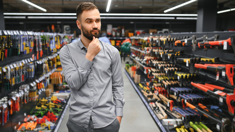 Person shopping in a hardware store