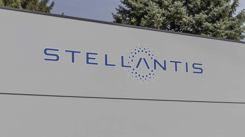 A gray building with Stellantis advertised in blue