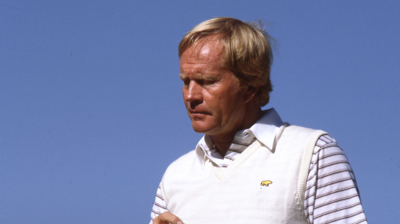 Jack Nicklaus against a solid blue sky background