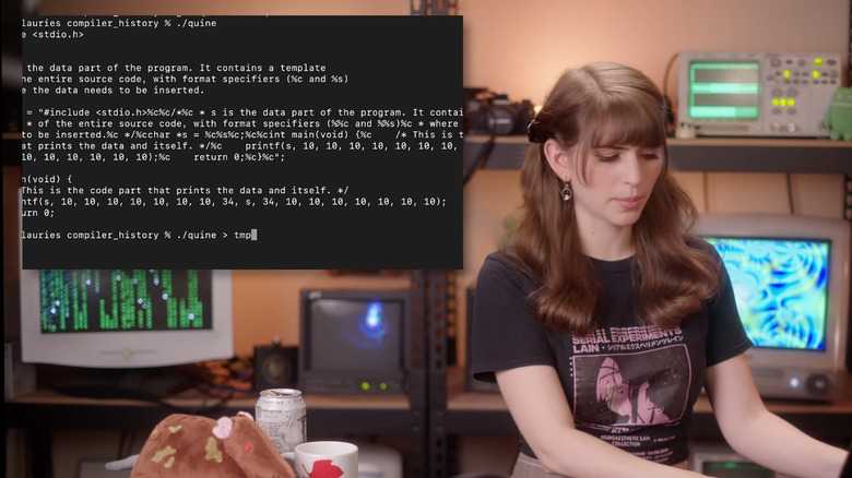 Laurie typing code into her laptop