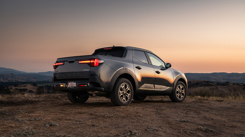 A rear view shot of a 2026 Hyundai Santa Cruz XRT parked