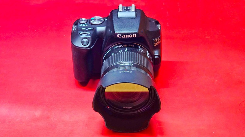 the author's camera on a red surface