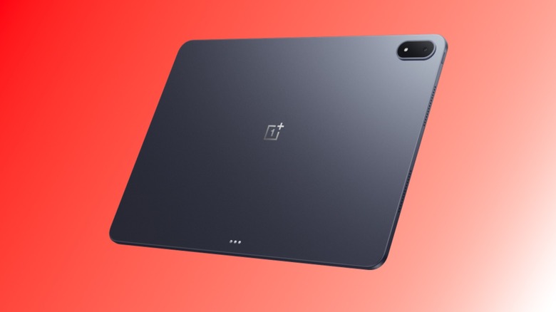 the OnePlus Pad 3 on a red gradient background