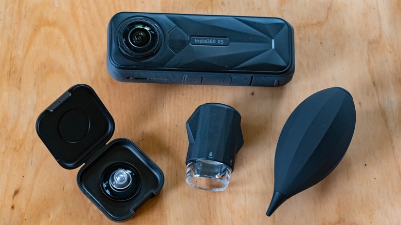 The Insta360 X5 alongside the replacement lens kit.