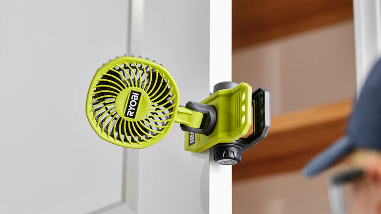 Ryobi USB Lithium clamp fan attached to a door