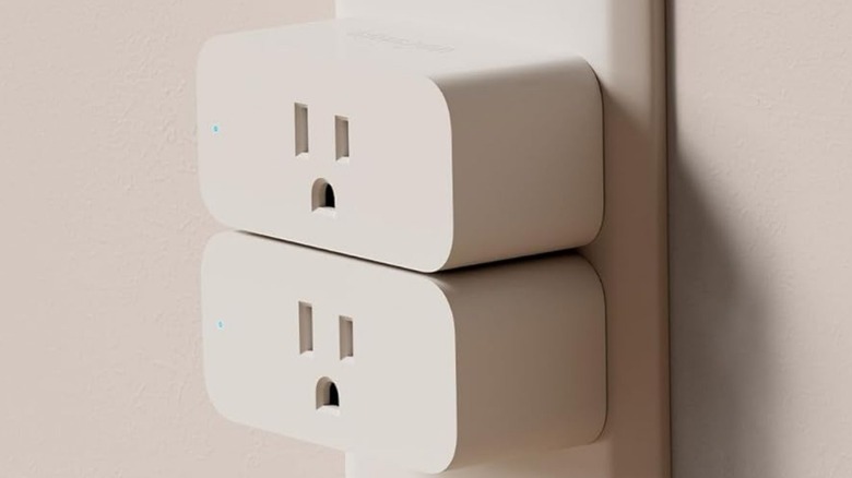 Two Amazon Smart Plugs in electrical outlet.