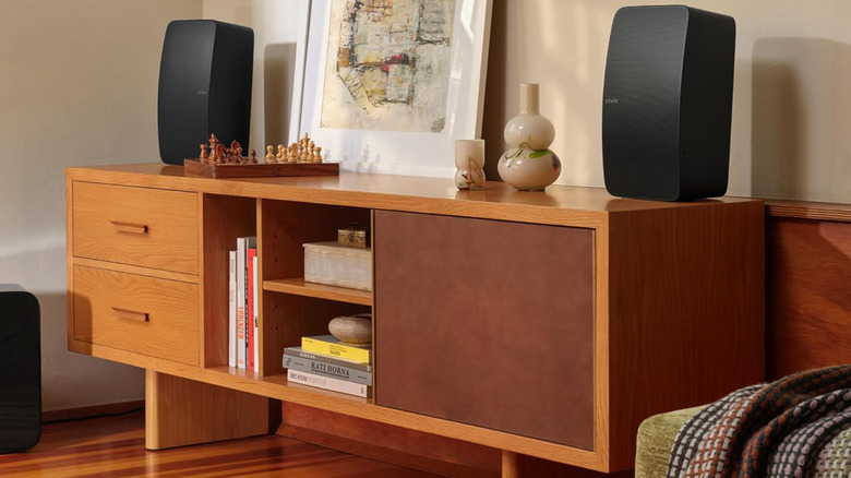 Two Sonos Five speakers on a living room table