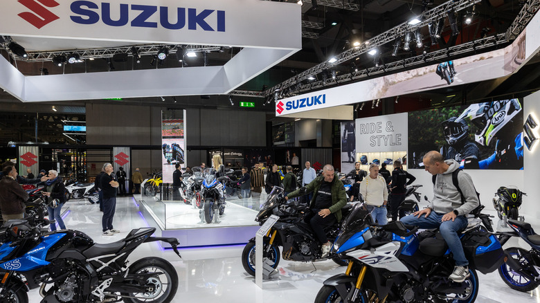 the Suzuki motorcycles area at an auto show.