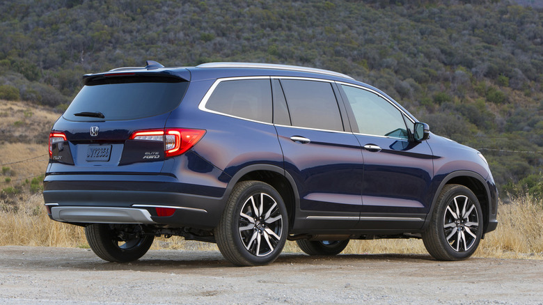 Third generation Honda Pilot Elite, rear 3/4 view