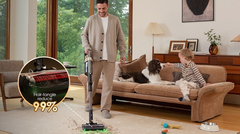 A man uses the Tineco PURE ONE A90S in the living room.