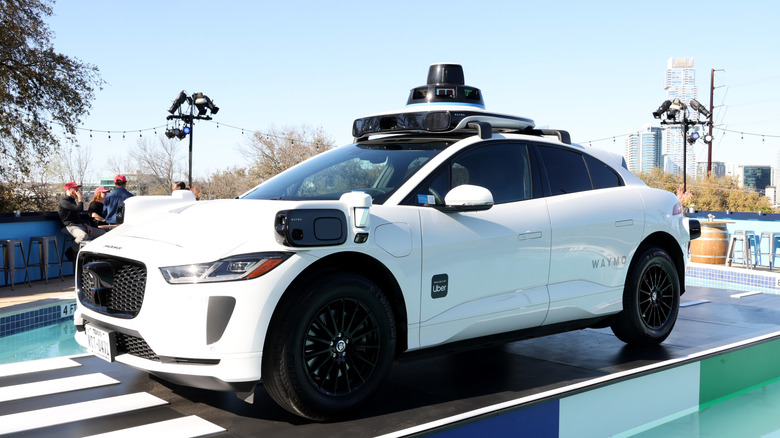 Uber and Waymo's driverless car.